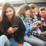 Young People; Mobile Phone; Friends; City; Generation Z; Group of people; Internet; Text; Wireless technology; University Student; Student; Communication; Connection; Portability; Telephone; Hold; Social Media; Surf the Internet; Technology; Look; Smart P